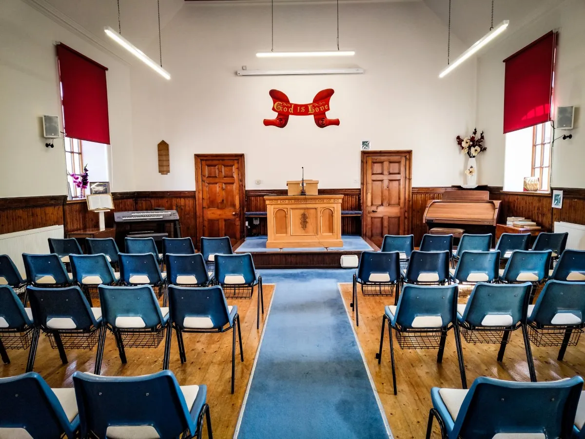 Reading from the Bible at the Portknockie Church of Christ